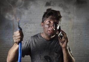 electrocuted man calling for help in dirty burnt funny face