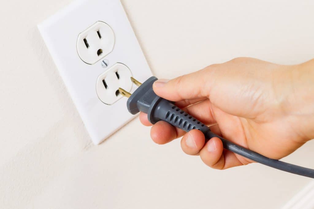 Inserting Power Cord Receptacle in wall outlet